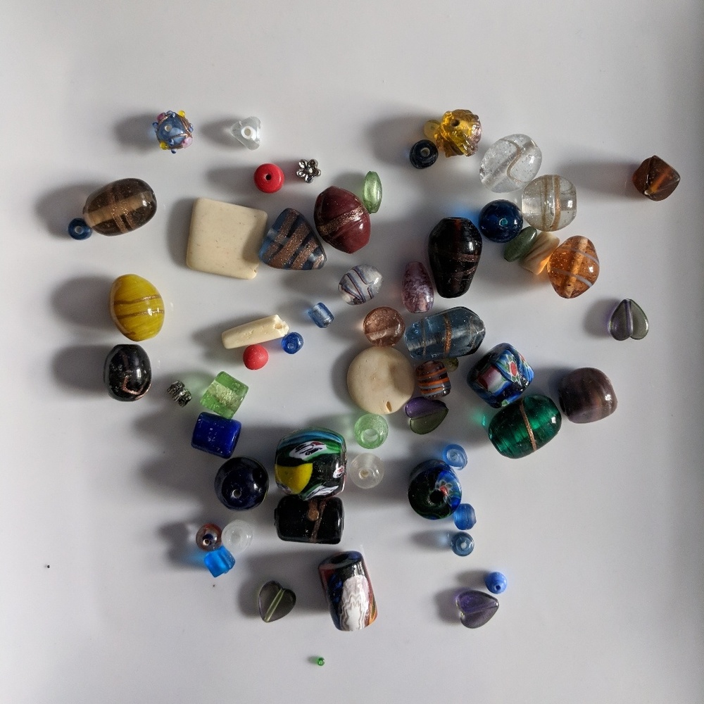 Bag of glass and stone jewelry beads